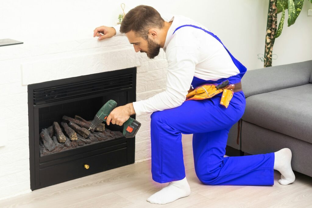 building master examines a new fireplace