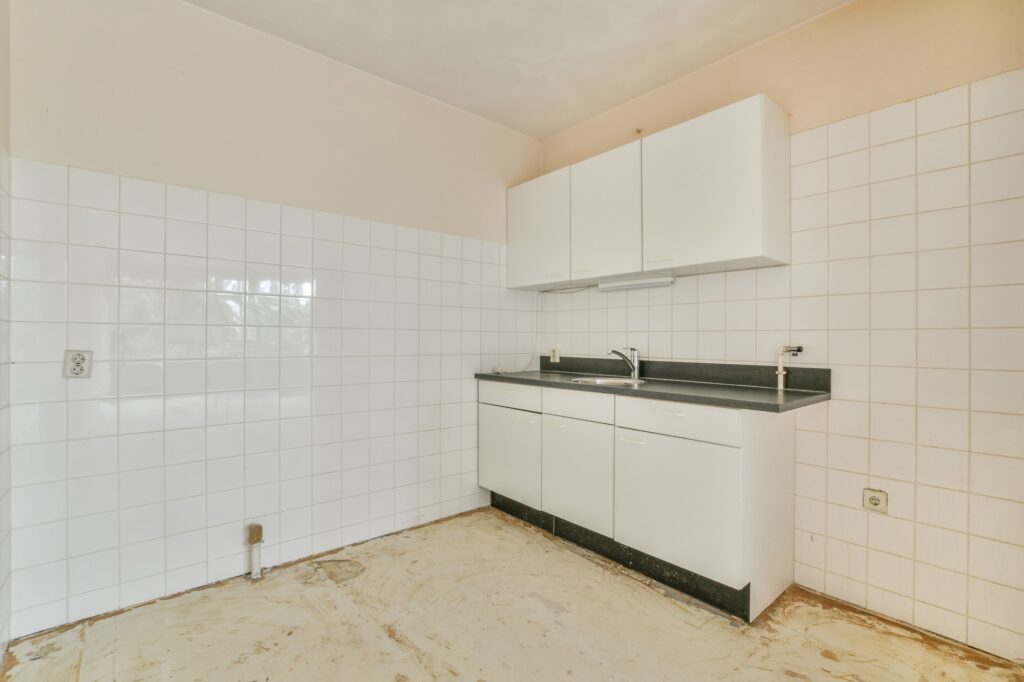 Miniature kitchen with black worktop